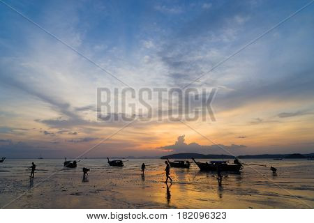 People on the beach in Ao Nang Krabi at sunset
