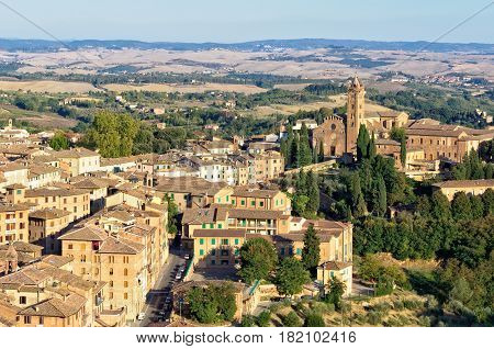 View of Santa Maria dei Servi and surrounding residential area from the Viewing Platform of the Duomo, Faccianote - Siena, Italy