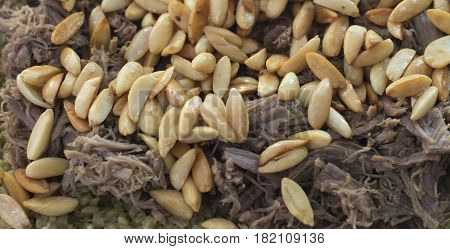 Mansaf - A meal of Traditional Syrian Freekeh with beef meat closeup