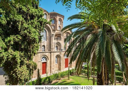 View of green garden and Church of Panagia Chalkeon in Thessaloniki. Greece Europe