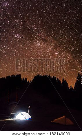 Camping under the stars. Amazing star night panorama