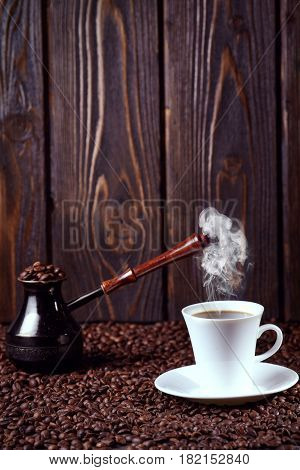 Coffee. Turkish coffee. Armenian Turkish coffee. Cezve and cup of coffee. Traditional serving coffee.
