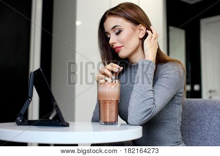 Smiling Woman with Coffee Frappe Drink at the Restaurant - Portrait of a beautiful girl with frappuccino