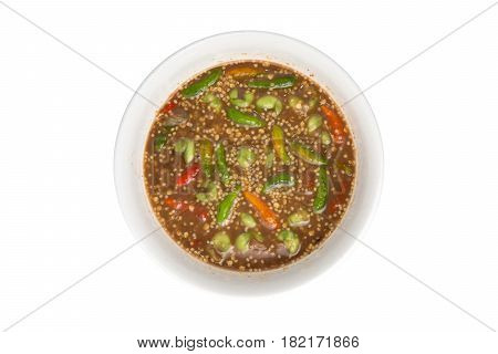 Shrimp paste sauce on white background. (nam prik kapi - thai spicy food recipes)