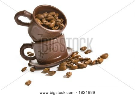 Kávová zrna v hnědé Cup