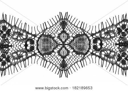 Black vintage decorative lacy ribbon isolated over white