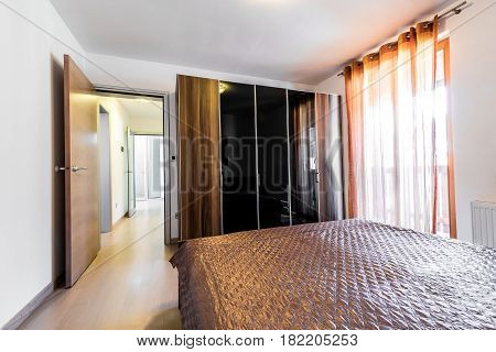 Modern Hotel Bedroom With Bed And Closet.