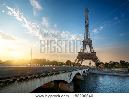 Eiffel Tower and bridge Iena on the river Seine in Paris, France