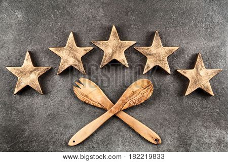 Five stars on dark background