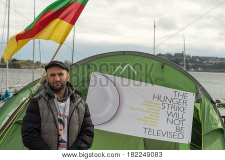 CARDIFF UK - APRIL 14 2017 Imam Sis conducting hunger strike outside Senedd. Protest by Kurdish Solidarity Wales in support of polital prisoners jailed in Turkey by National Assembly of Wales