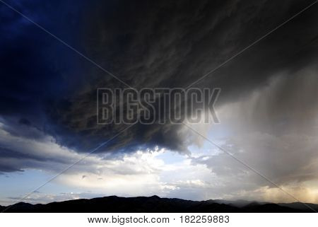 Stom clouds in sky many storms 