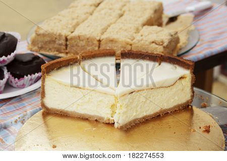 Caramel and chocolate cheesecake on the street food festival.