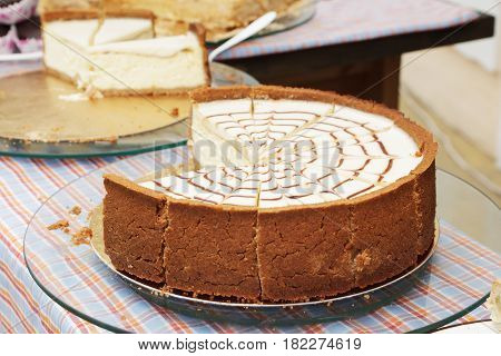 Caramel and chocolate cheesecake on the street food festival.
