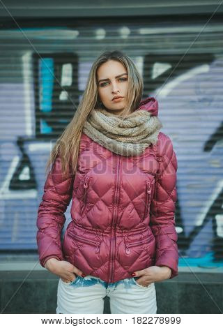 Woman on the street. Streetstyle look. Outumn or earlier spring in the city.