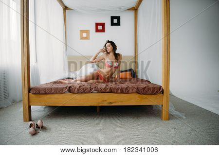 Dream On. Beauty Adult Brunette Woman In Lingerie On Bed. Sexual Woman In Lingerie. Seduction Woman.