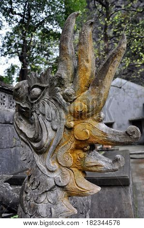 Antique Carving In Stone With Mythical Motif. Bich Dong Pagoda, Vietnam