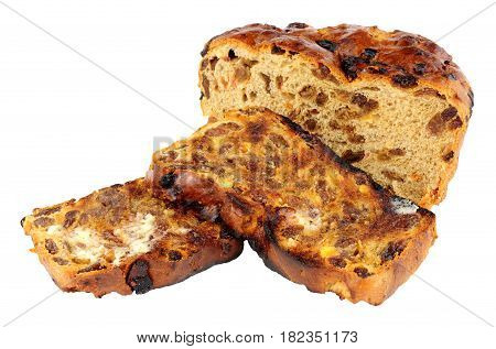 Toasted Irish barmbrack sweet bread slices with butter isolated on a white background