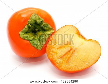 Orange ripe persimmon isolated on a white background