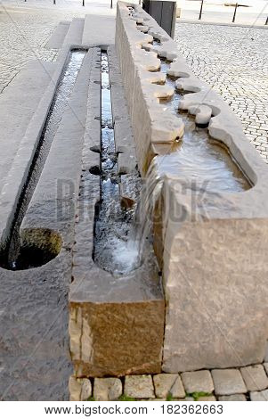 Fountain on the main square Torgallmenningen of Bergen Norway