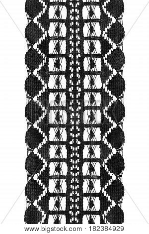 Black cotton vintage lace ribbon on white background