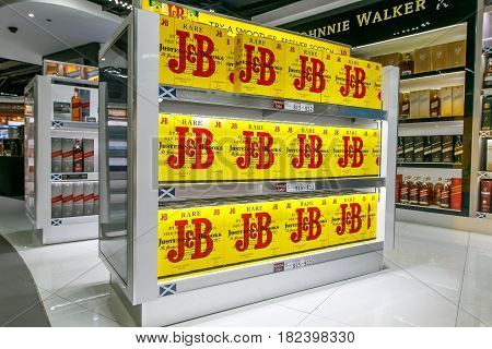 Saint Martin Dutch Antilles March 28 2017: J & B whiskey bottles stand for sale in a airport duty free store.