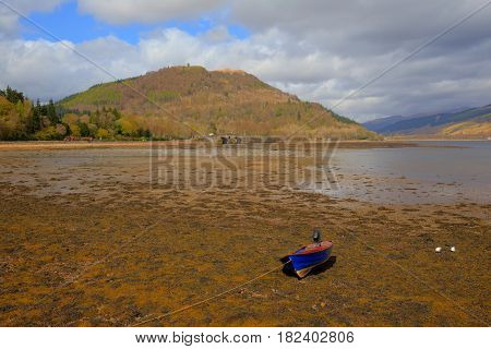 Inveraray Argyll and Bute Scotland UK Scottish town view across Loch Fyne with boat