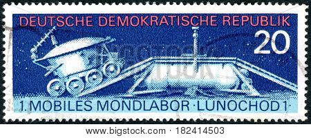 GERMANY - CIRCA 1971: A stamp printed in Germany (GDR) shows the first of two unmanned lunar rovers - Lunokhod 1 circa 1971
