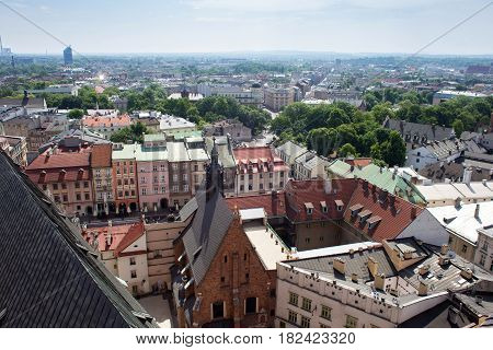 Aerial view of the Cathedral of St. Barbara and the Jesuit Monastery and other roofs of houses in the historic part of Krakow. Poland.