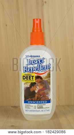 RIVER FALLS,WISCONSIN-APRIL 18,2017: A bottle of Walgreen's brand insect repellent with a wood background.