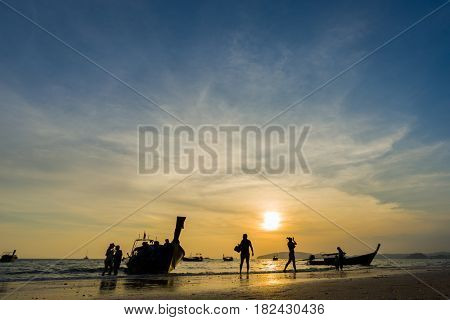 People on the beach in Ao Nang Krabi at sunset