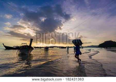 Ao Nang Krabi Thailand - March 02 2017: People on the Ao Nang beach at sunset in Krabi province Thailand
