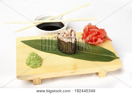 Japanese poppies with eel, salmon, flying fish roe, shrimp and ginger isolated on white background