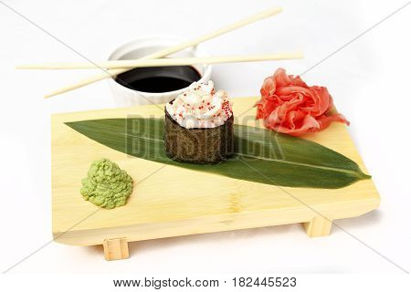 Japanese poppies with eel, salmon, flying fish roe, shrimp and ginger isolated on white background