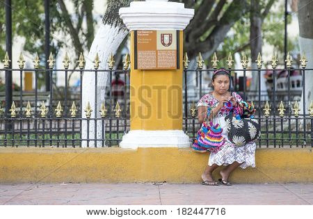 valladolid Mexico 13th March 2017: woman doing handicraft work in a park
