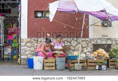 valladolid Mexico 13th March 2017: woman selling vegetables outdoors