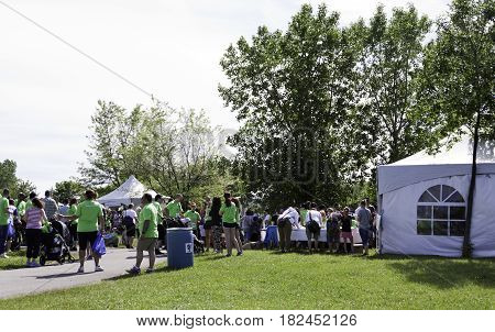 Laval, Quebec - June 14, 2015 - Landscape view of the entrance and sign-up tables at the 