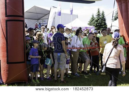 Laval, Quebec - June 14, 2015 - Landscape of a large group of people at the starting line of the 