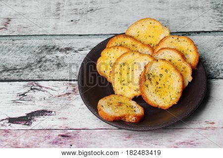 Garlic Bread On Black Retro Plate