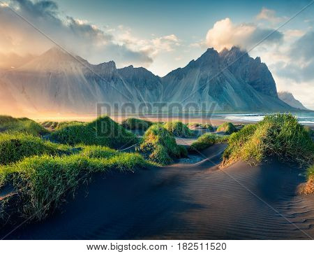 Black sand dunes on the Stokksnes headland on southeastern Icelandic coast. Iceland Europe. Artistic style post processed photo.