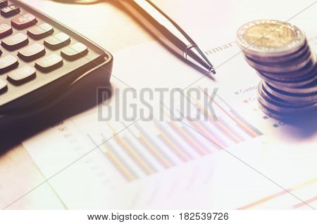 Finance Saving Concept, Calculator With Cion On Paperwork Report.