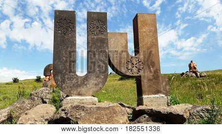 All letters of the Armenian alphabet at the foot of the mountains