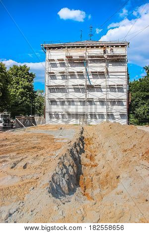 Partially built residential housing building site with homes in early stages of construction