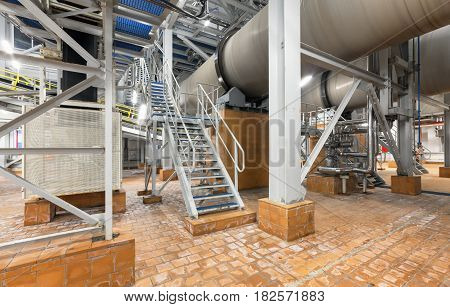 Stair next to the cooling drum mold at the plant for the production of ammonium nitrate