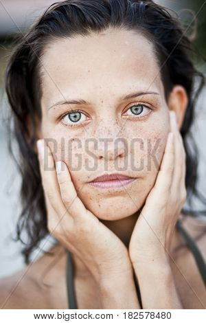 Portrait of sensual woman with freckles, clouse up