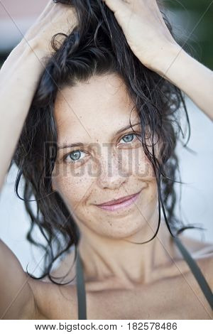 Portrait of sensual woman with freckles, clouse up