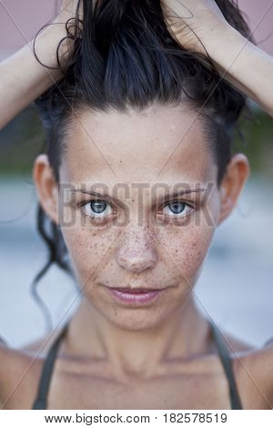 Portrait of sensual woman with freckles, clouse up