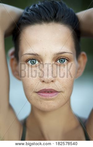 Portrait of sensual woman with freckles, clouse up