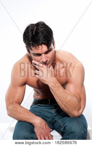 The roman warrior is in a crouched position.