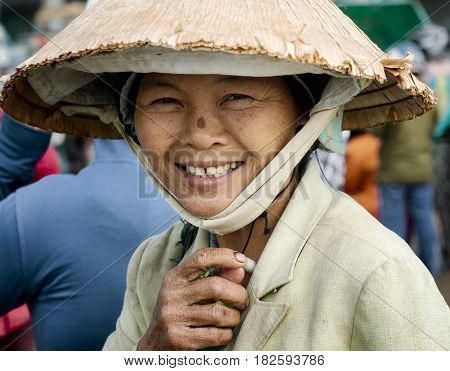 Portraiit of a smiling Vietnamese woman. December 26 2013 - Da Nang Vietnam