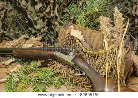 still life: beautiful hunting rifle and equipment
